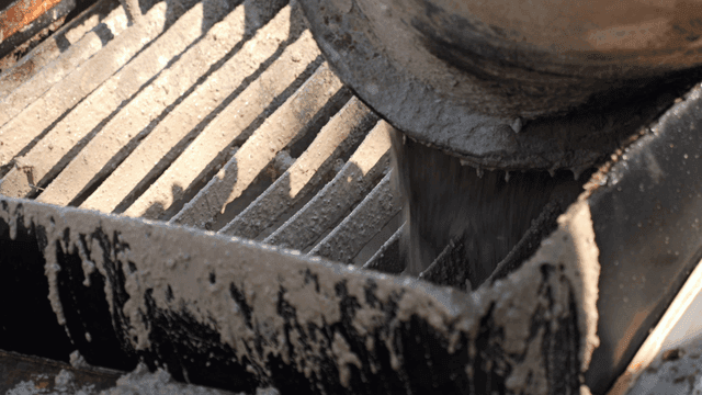 Concrete pouring into a mold