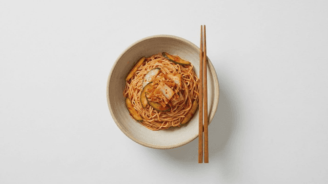 Bowl of bibim guksu with chopsticks
