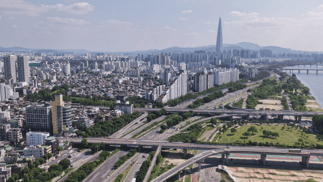 City view with high-rise buildings and highways