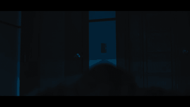 Woman quietly closing a door