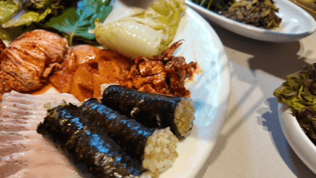 Korean dishes with pork and side dishes
