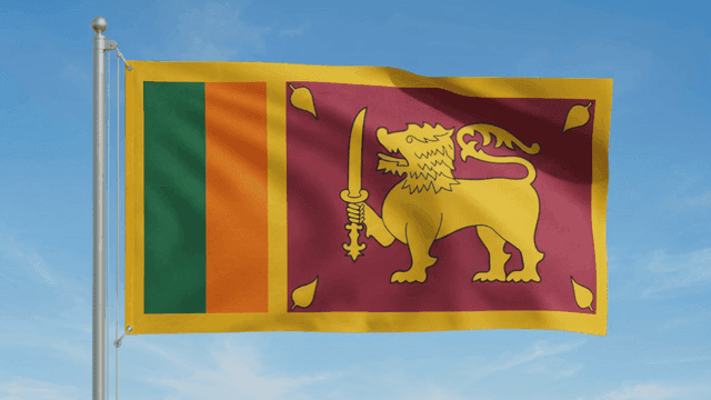 Sri Lankan flag fluttering under clear sky