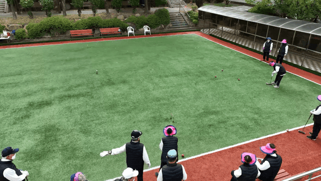 Seniors enjoying gateball outdoors