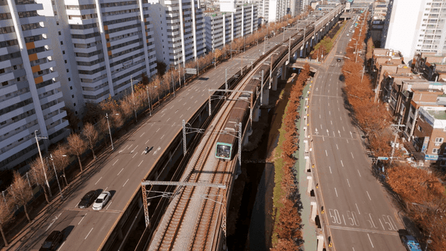 City roads and railways with apartments