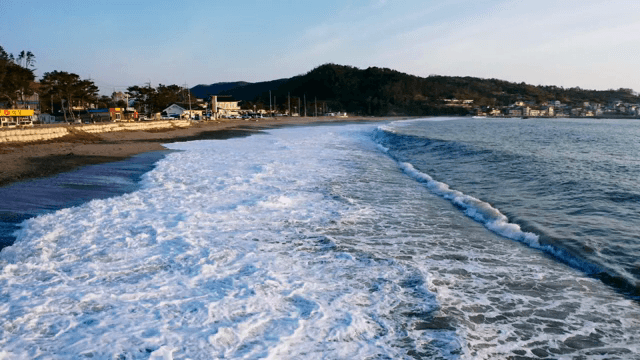 Waves gently crashing on a serene beach