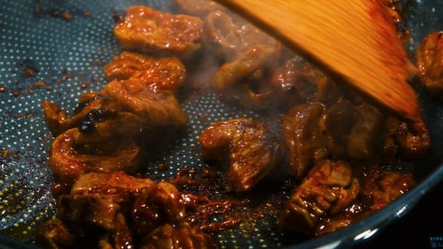 Stir-Fried Intestines Cooked in a Frying Pan