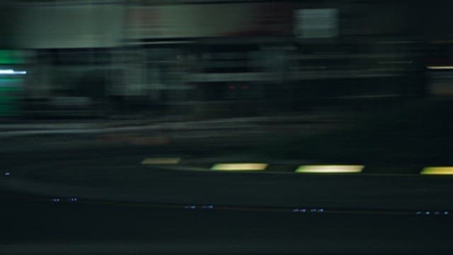 Fire Truck and Ambulance Crossing the Road at Night