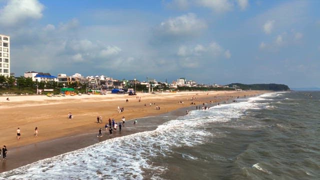 People enjoying a sunny day at the beach