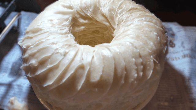 Round, generously piled on top of wheat pancakes