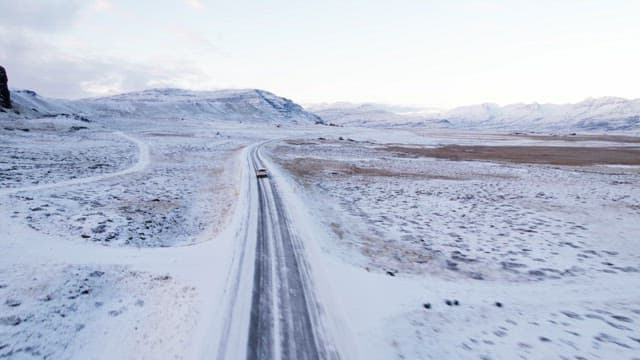 Car driving on a snowy road