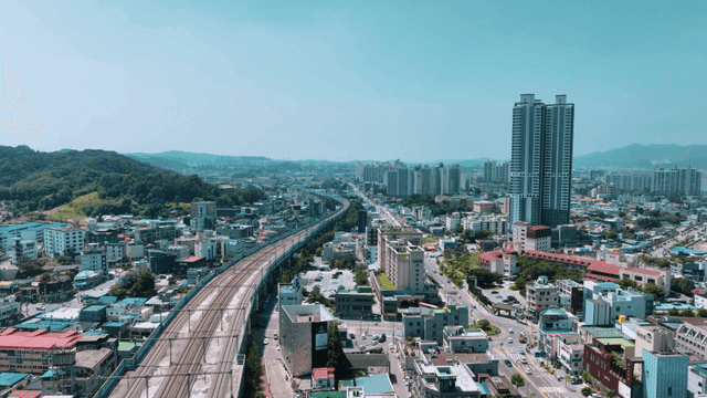 Cityscape with high-rise buildings and railways