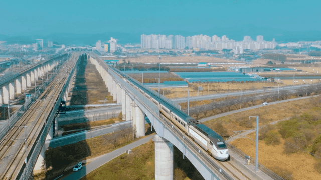 High-speed train on elevated tracks