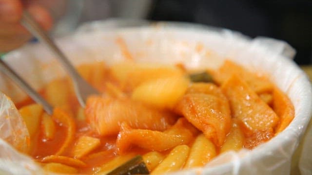 Spicy tteokbokki with forks