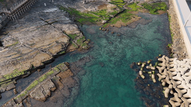 Coastal rocks and clear sea water