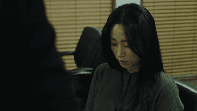 Office woman with dark expression