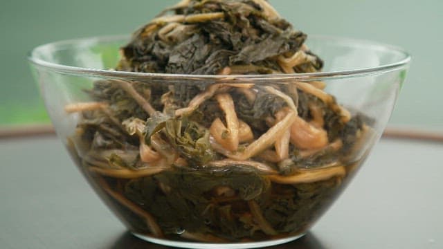 Boiled dried radish greens in a glass bowl