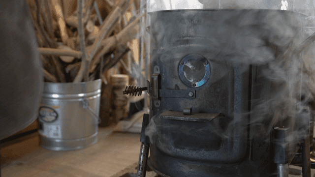 Stove burning with firewood