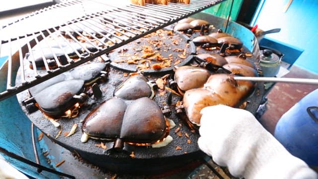 Korean fish-shaped pastry being cooked