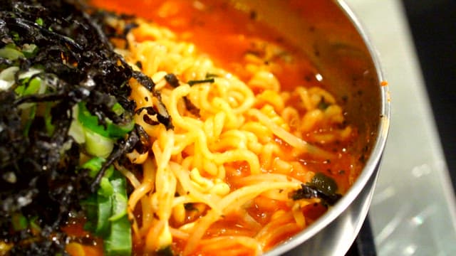 Spicy ramen with seaweed and vegetables