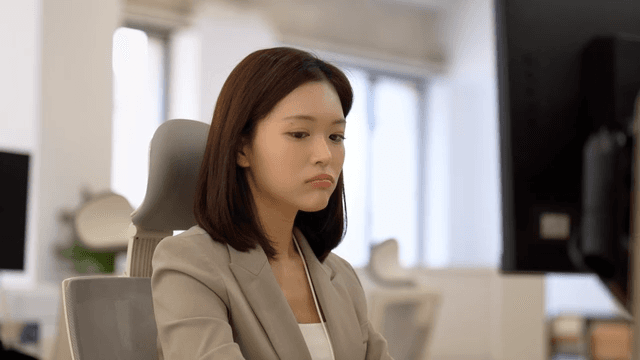 Office women who are stressed while looking at monitors in office