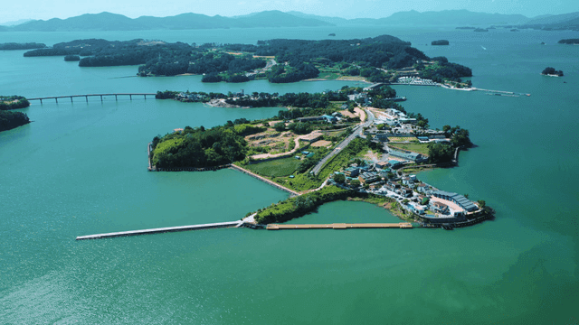 A scenic island surrounded by blue waters
