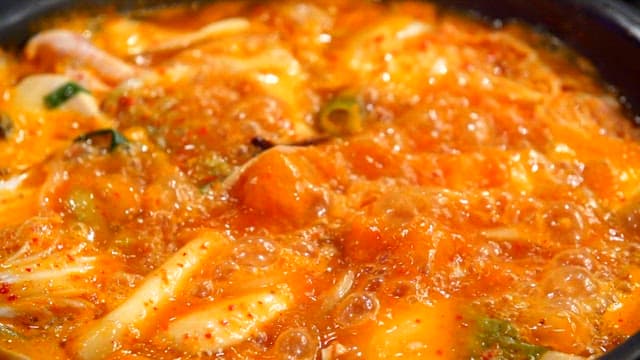 Spicy chicken hotpot boiling in a pot