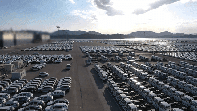 Large parking lot filled with cars