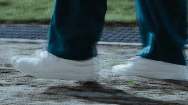Person walking on dirt road