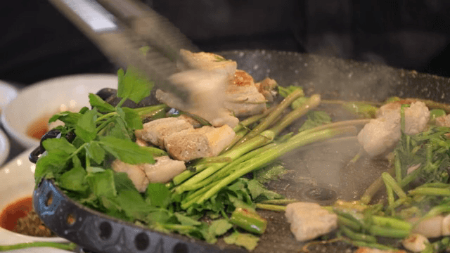 Grilling Grilled pork belly with fresh water parsley