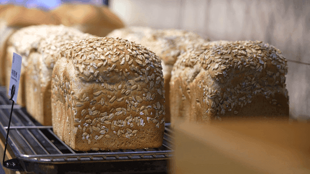 Freshly baked sesame bread on display