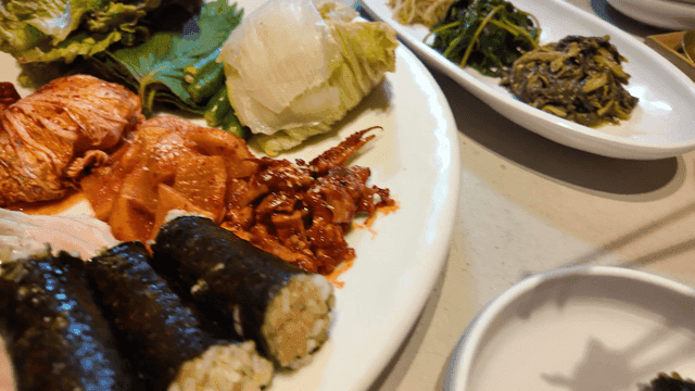 Plate of Korean dishes with kimchi