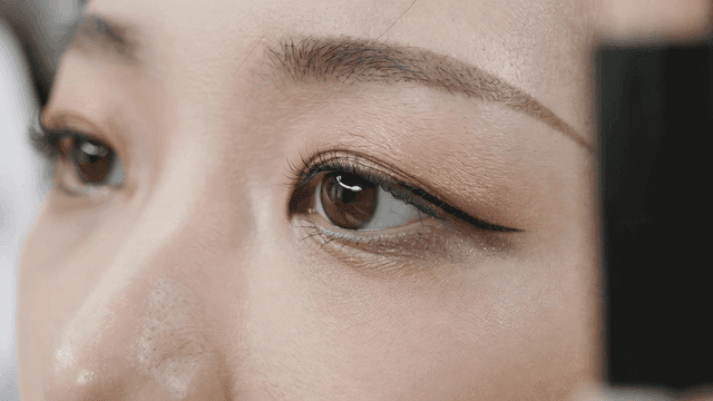 Close-up of a woman's eye with makeup