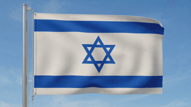 Israeli flag fluttering under clear sky