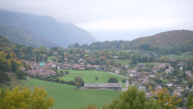 European castles and villages surrounded by autumn foliage