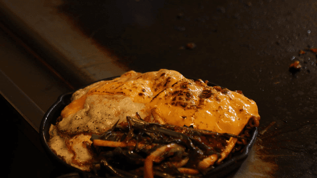 Torch for grilling cheese and green onion kimchi