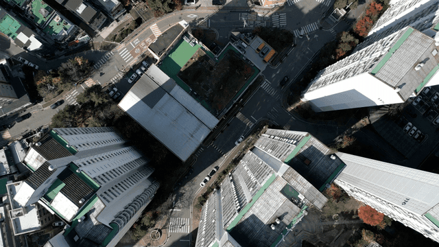Aerial view of high-rise apartment complex and street