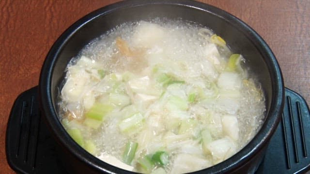 Dried pollack hangover soup served in a hot ttukbaegi