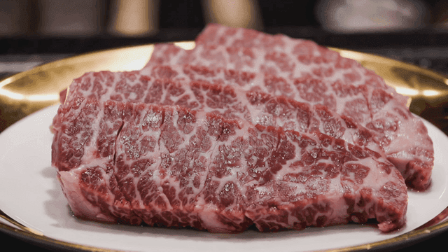 Marbled beef on a white plate