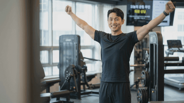 Man smiling at gym