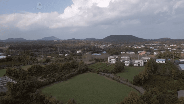 A rural landscape with farms and houses