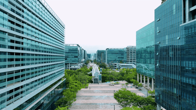 Modern cityscape with green trees
