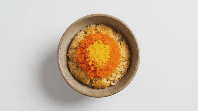 Steaming bowl of flying fish roe rice