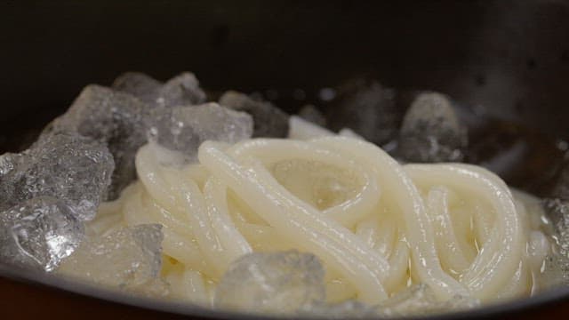 Bowl of noodles with ice and brown sugar