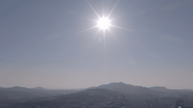 Sun shining brightly in vast sky