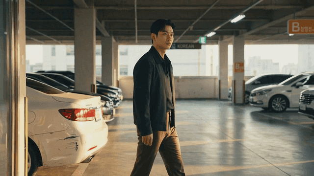 Man walking in parking lot