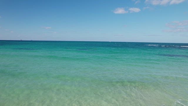 Clear turquoise sea with gentle waves