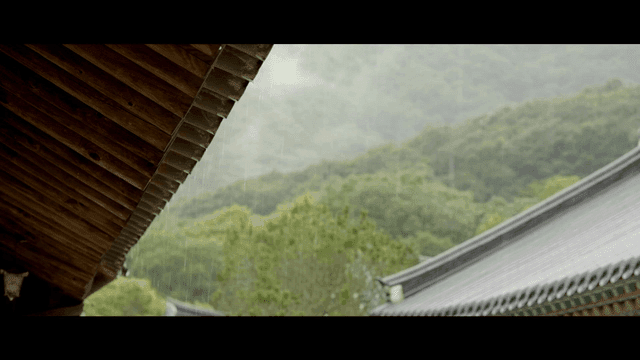 Rain falling on a traditional Korean house