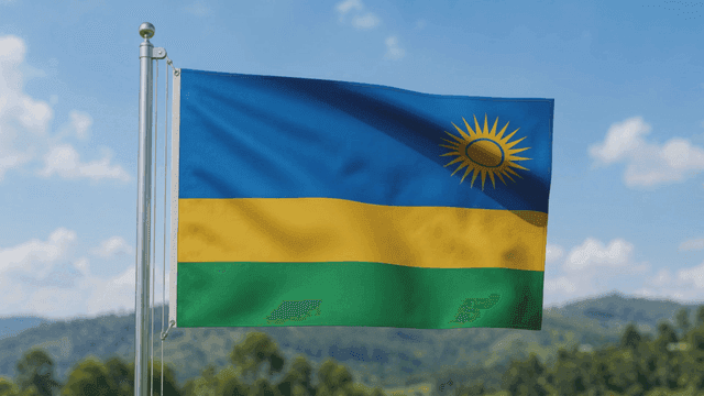 Rwandan flag fluttering in front of beautiful nature