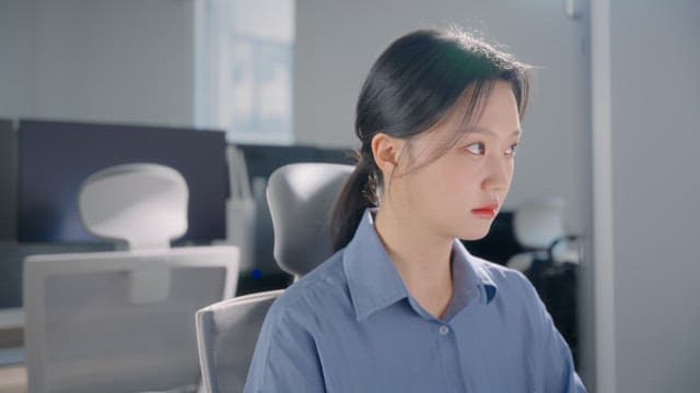 Woman working at a desk in an office