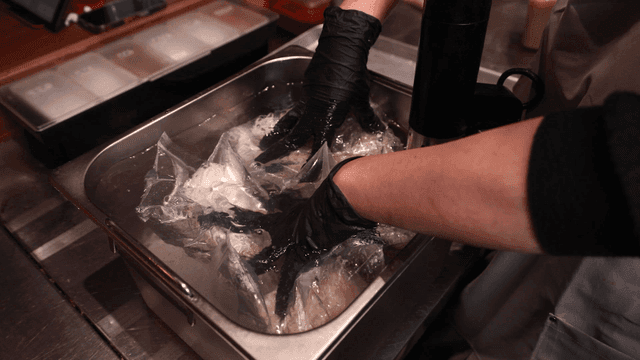 Sous vide chicken cooking in vacuum-sealed bag